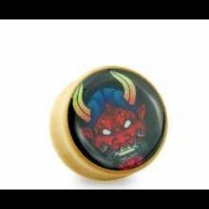 Devil plugs body jewelry